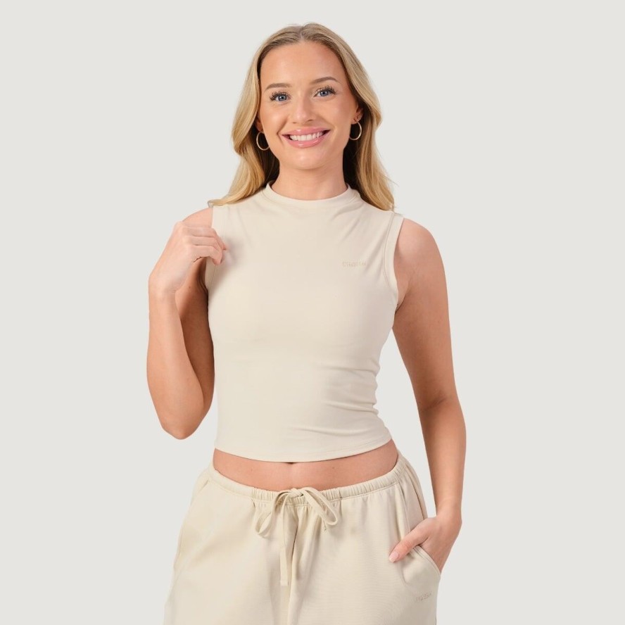 Top damski fitness slim bez rękawów z golfem NEO
