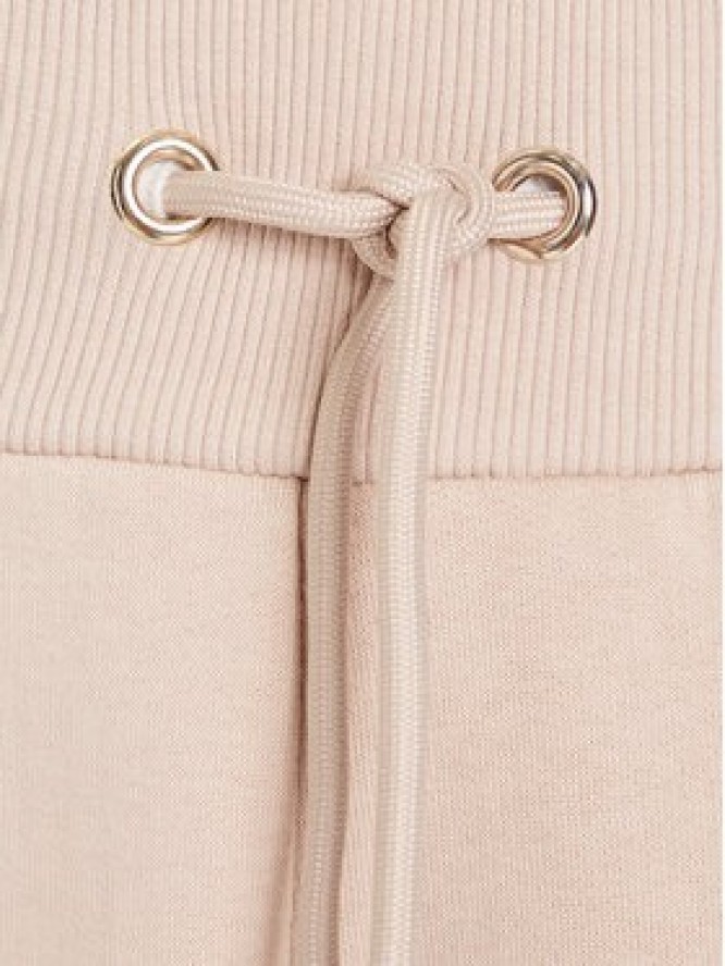 Guess Spodnie dresowe V5BB10 KB681 Beżowy Regular Fit