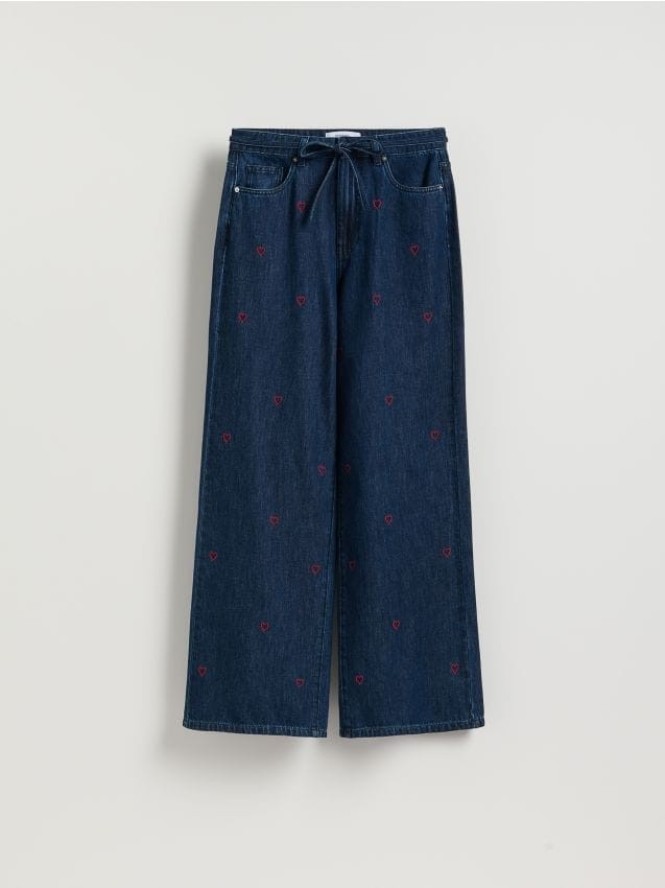 Jeansy wide leg z haftem - granatowy