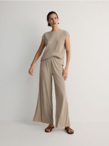 Plisowane spodnie wide leg - beżowy