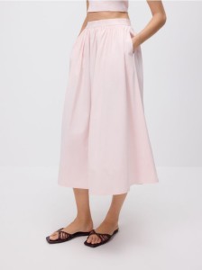 Rozkloszowana spódnica midi - pastelowy róż