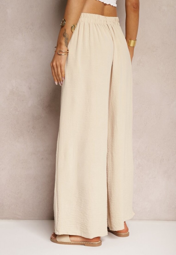 Beżowe Spodnie w Stylu Alladynek High Waist Wykończone Gumką w Pasie Riselma