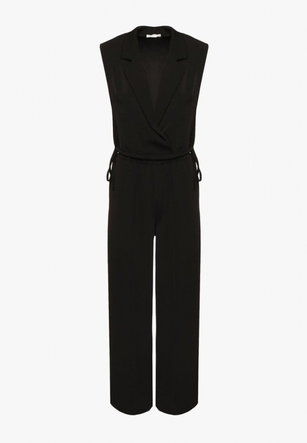 Czarny Komplet Kopertowa Bluzka z Kwiatową Broszką i Szerokie Spodnie Reavilia