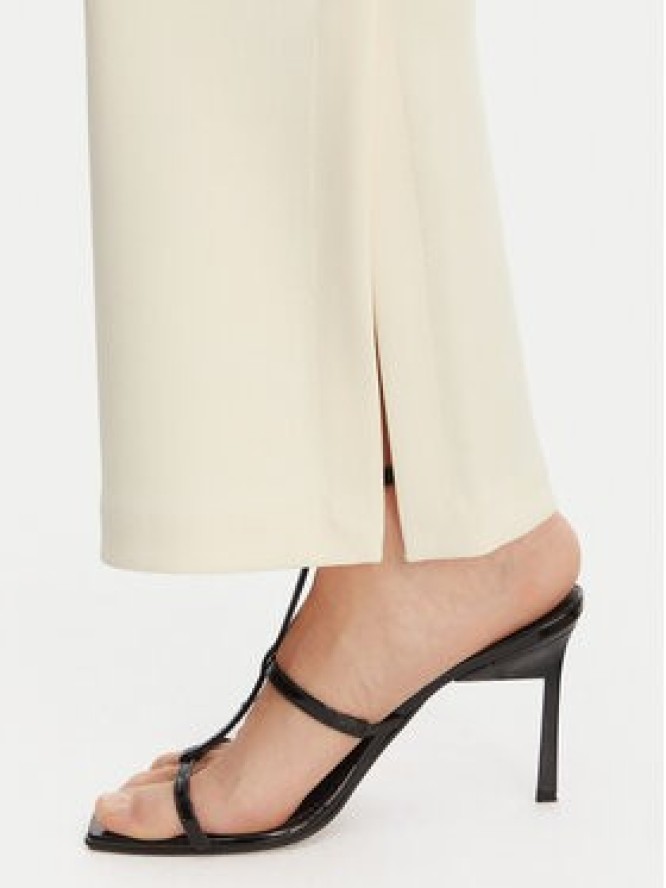 Calvin Klein Spodnie materiałowe LV044B223G Beżowy Flare Fit