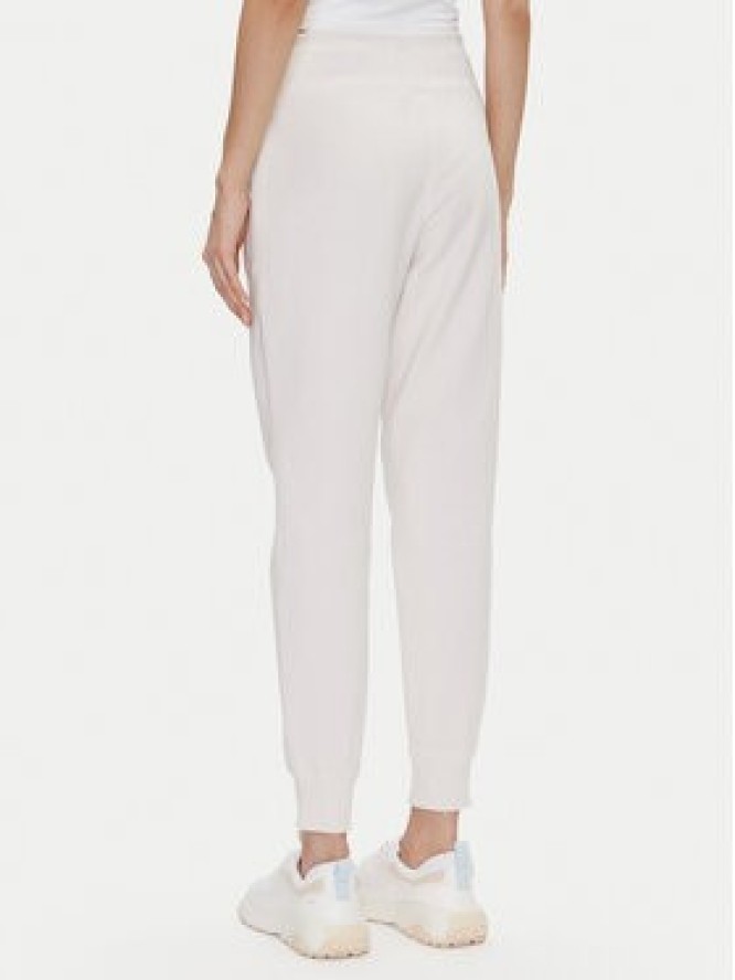 DKNY Sport Spodnie dresowe DP5P3496 Beżowy Regular Fit