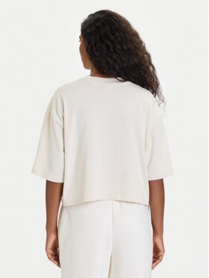 New Balance T-Shirt WT53904 Beżowy Regular Fit