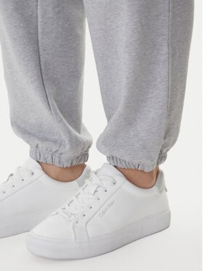 Calvin Klein Jeans Spodnie dresowe Foil Monologo LV047E826G Szary Regular Fit