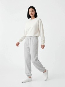 Damskie spodnie dresowe oversize UNLEASH WINGS GREY