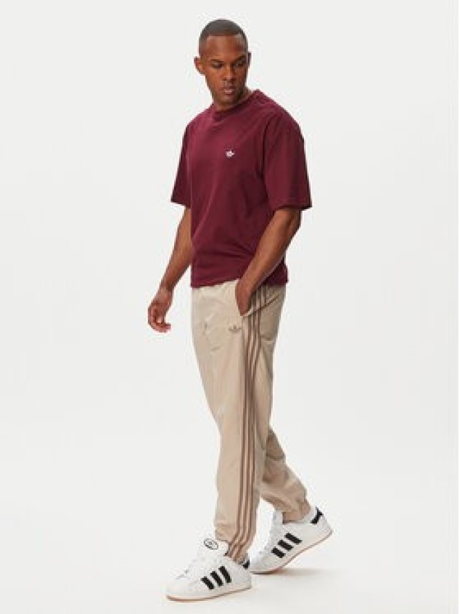 adidas Spodnie dresowe Firebird KS7503 Beżowy Regular Fit