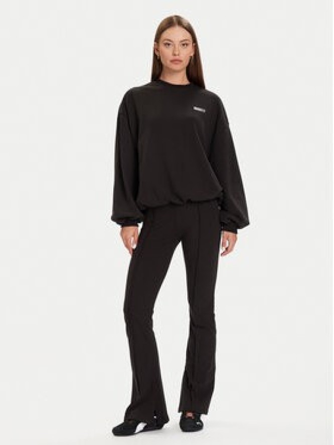 Puma Spodnie dresowe PUMA X ROSÉ 635156 01 Czarny Slim Fit