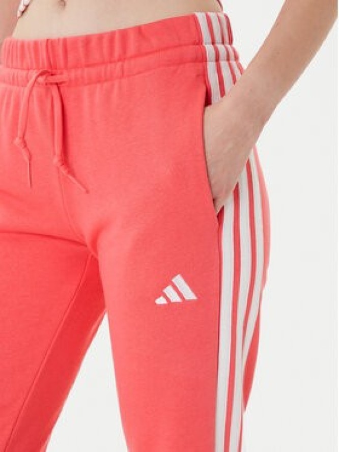 adidas Spodnie dresowe Essentials 3-Stripes KE4387 Koralowy Regular Fit
