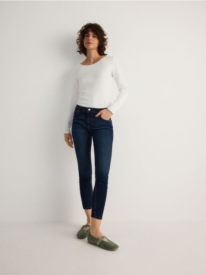 Jeansy slim fit ze średnim stanem - granatowy
