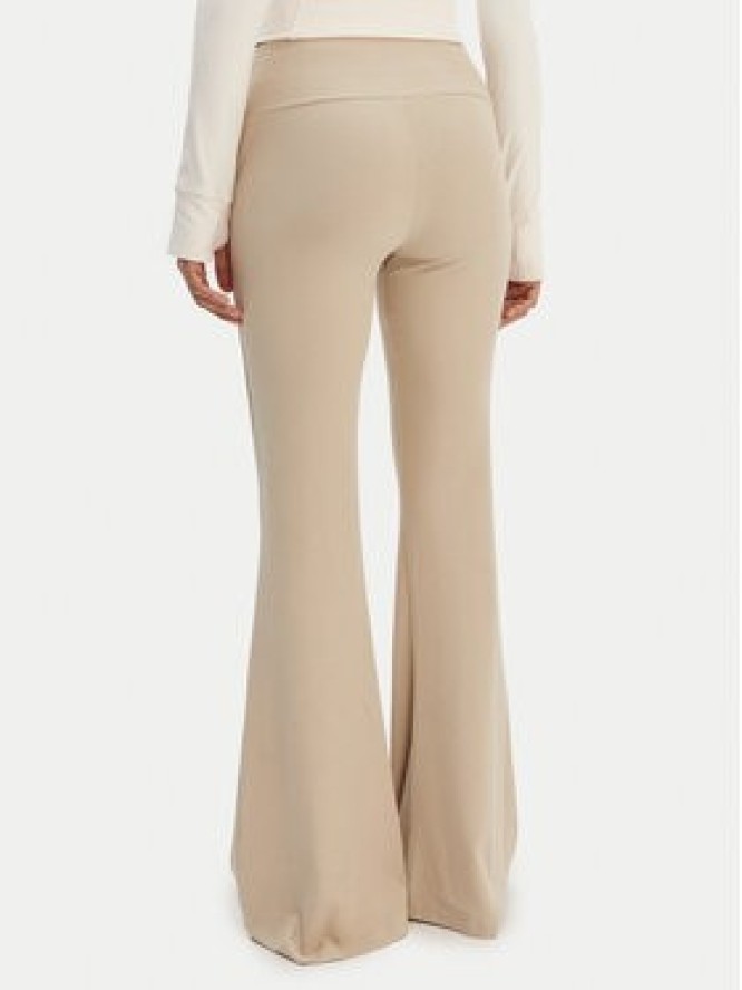 adidas Legginsy Essentials KD3850 Beżowy Flared Leg