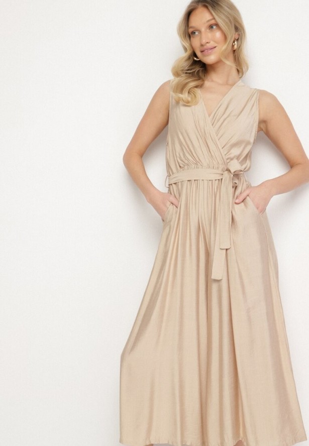 Beżowy Taliowany Kombinezon z Wiskozą i Paskiem Evithrae