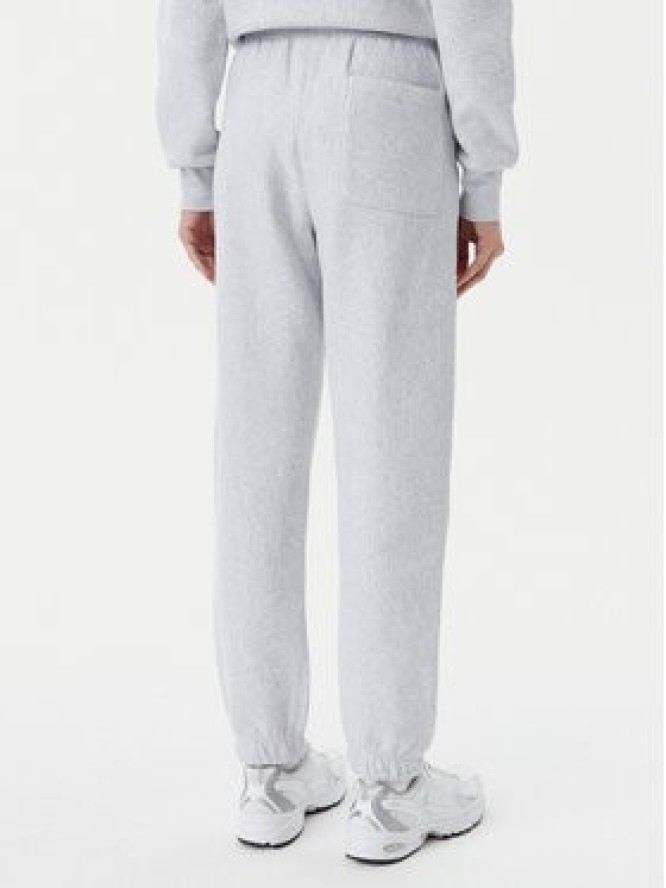 Champion Spodnie dresowe 117872 Szary Slim Fit