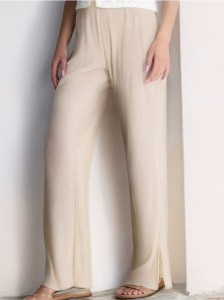 Plisowane spodnie z szerokimi nogawkami - kremowy