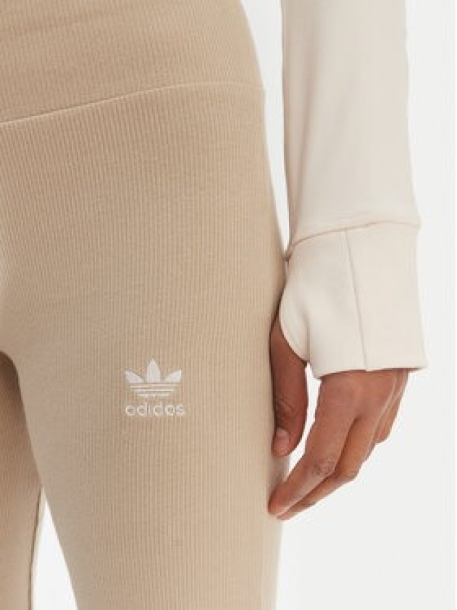 adidas Legginsy Essentials KD3850 Beżowy Flared Leg