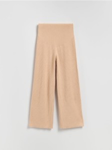 Dzianinowe spodnie w prążek - beżowy