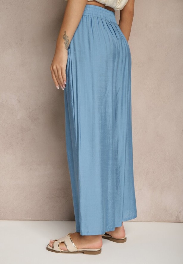 Niebieskie Spodnie Typu Palazzo o Szerokim Kroju High Waist Ozdobione Wiązaniem Yaslevia