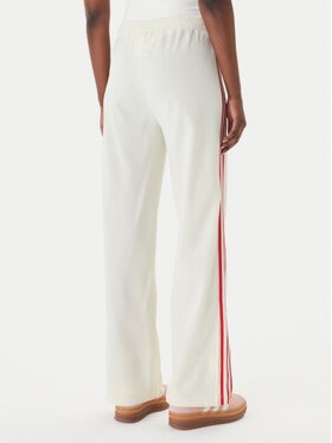 adidas Spodnie dresowe Firebird KQ8056 Beżowy Loose Fit