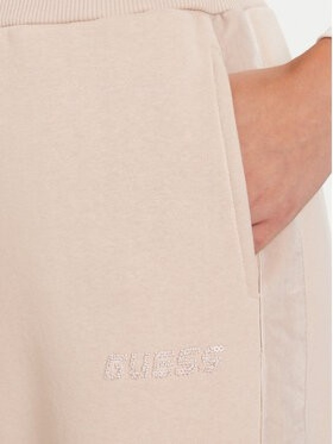Guess Spodnie dresowe V5BB10 KB681 Beżowy Regular Fit