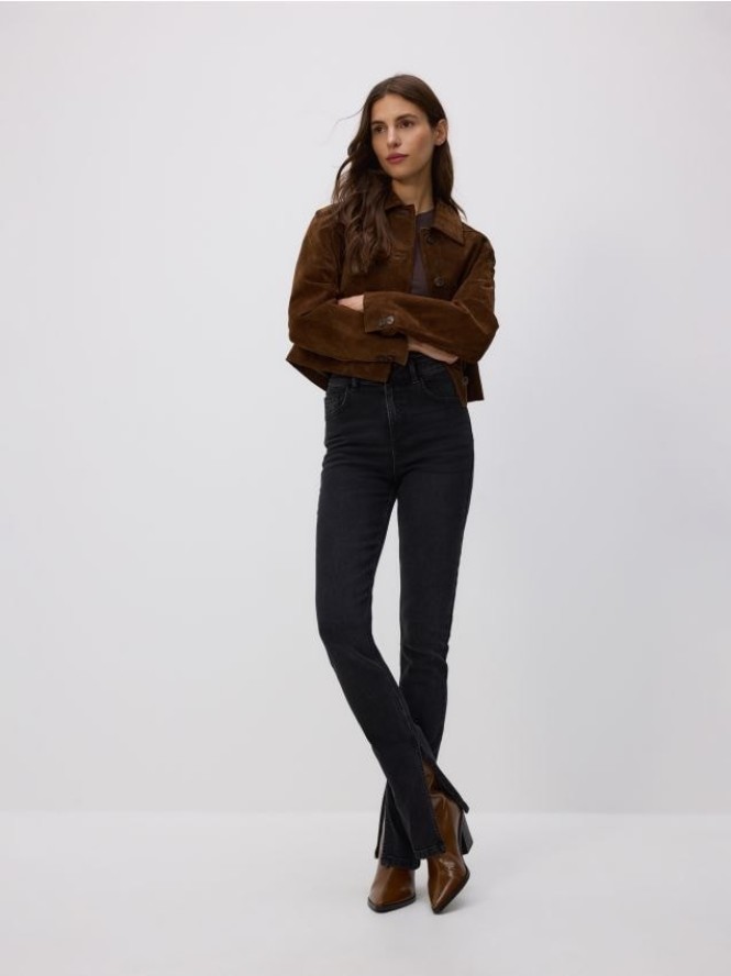 Jeansy slim fit z rozcięciem - czarny