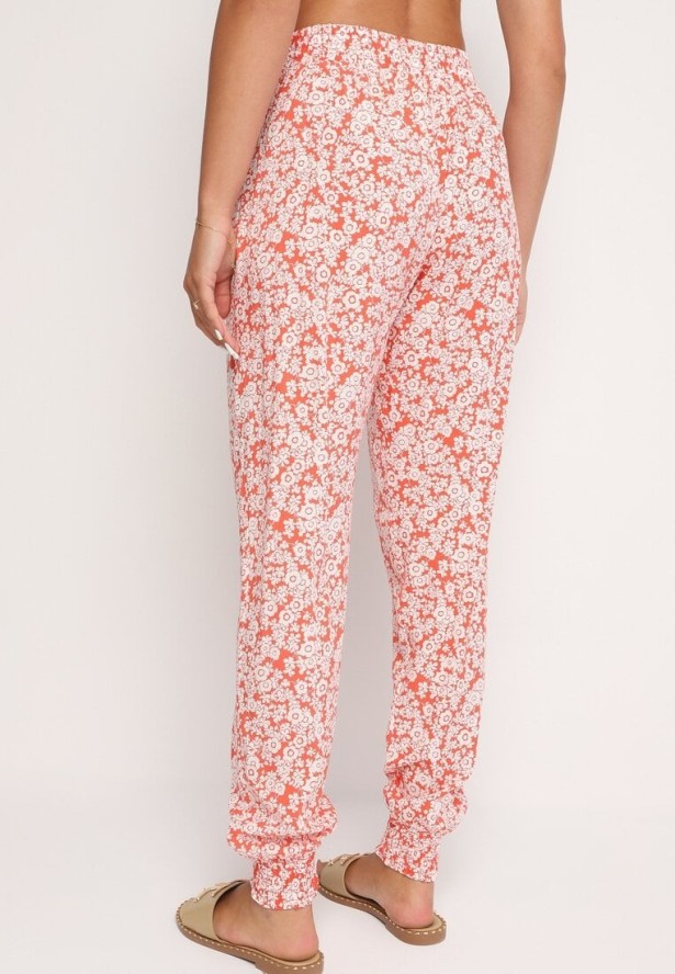 Pomarańczowe Kwiatowe Spodnie z Wiskozy Wykończone Gumką w Talii Rivattha