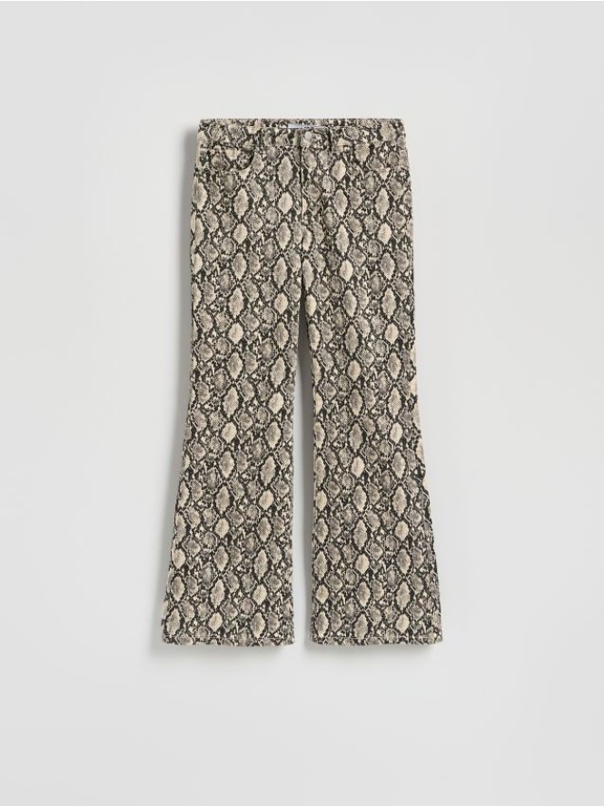 Jeansy w zwierzęcy wzór - wielobarwny