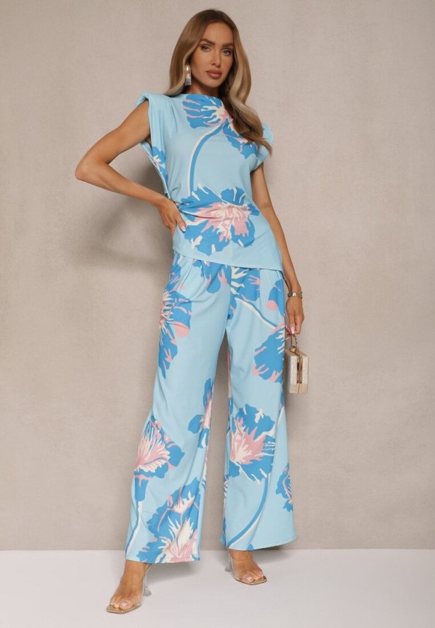 Niebieski Komplet Marszczona Bluzka o Asymetrycznym Kroju i Szerokie Spodnie w Kwiaty Linidia
