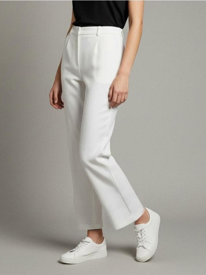 Eleganckie spodnie z zakładkami - kremowy