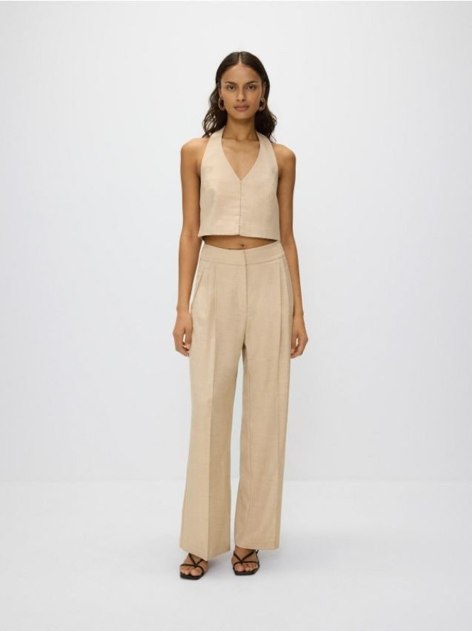 Spodnie z kantem - beżowy