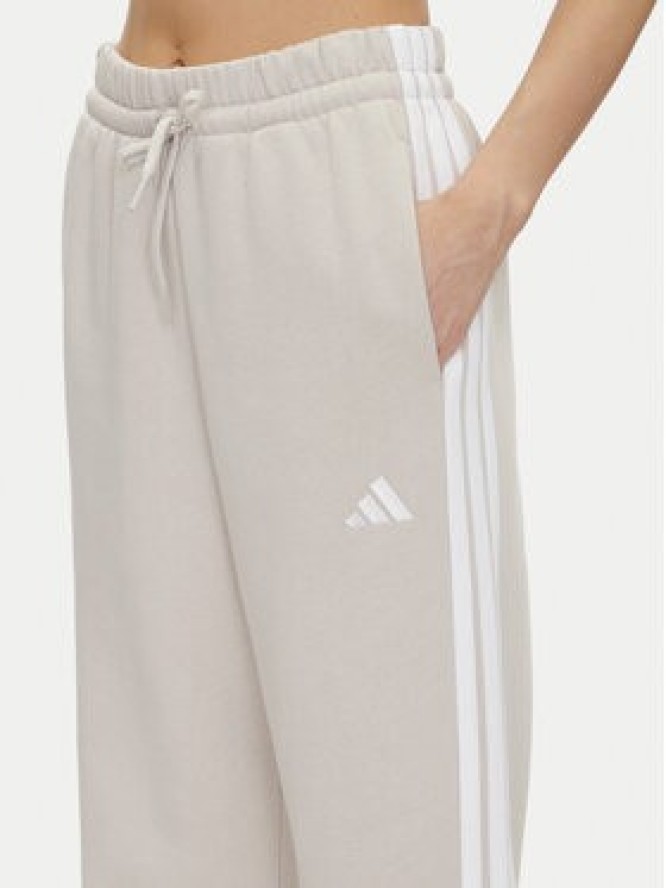 adidas Spodnie dresowe Essentials 3-Stripes JW9215 Beżowy Regular Fit