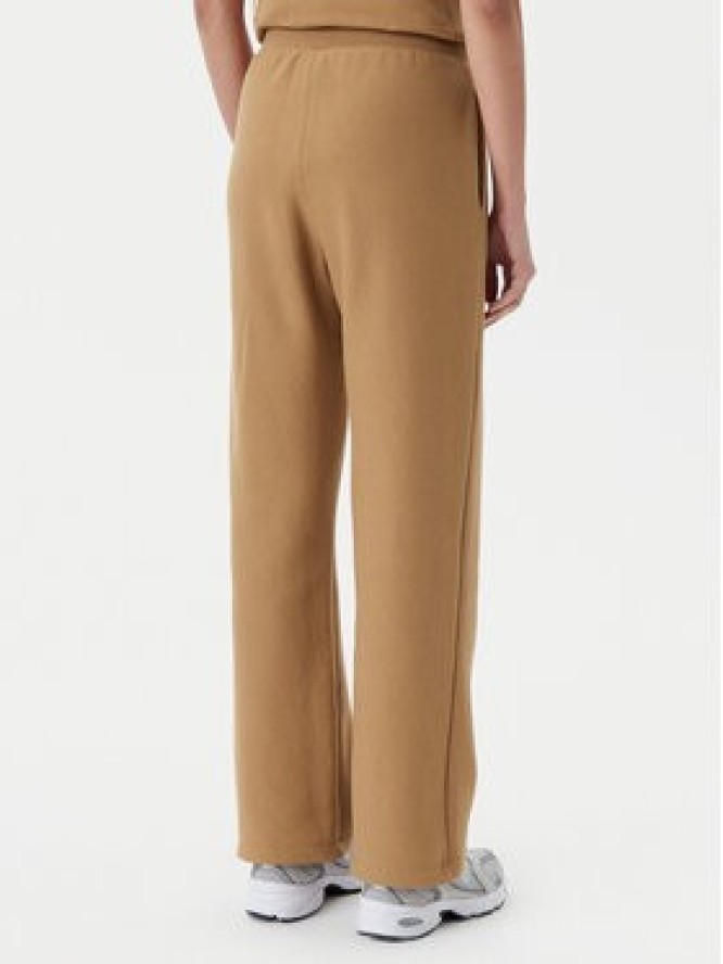 Champion Spodnie dresowe 117983 Brązowy Slim Fit