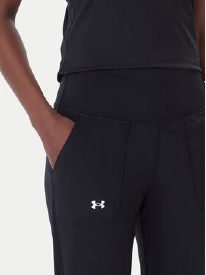 Under Armour Spodnie dresowe Motion 1375077 Czarny Slim Fit