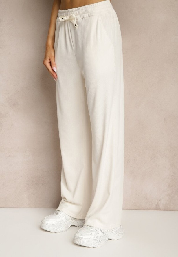 Jasnobeżowe Spodnie o Prostym Kroju z Gumką w Pasie Miritia