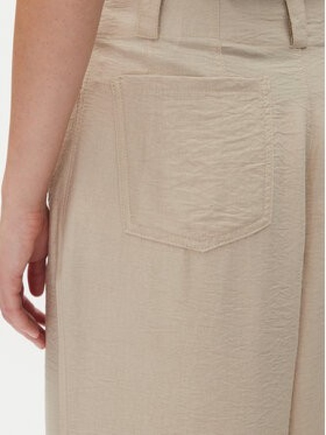 DKNY Spodnie materiałowe P41KTR48 Beżowy Loose Fit