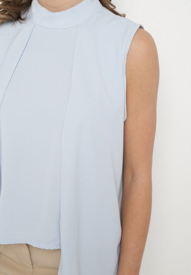 Jasnoniebieska Asymetryczna Bluzka z Dłuższymi Bokami Fadeleira