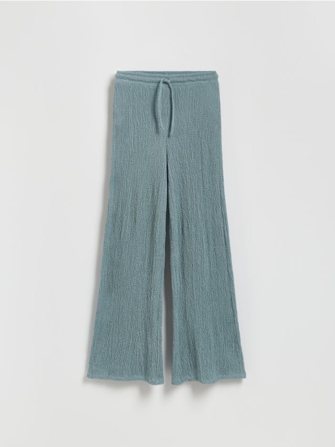 Kreszowane spodnie flare - jasnozielony