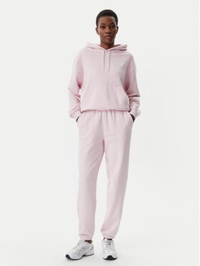 New Balance Spodnie dresowe Essentials WP41500 Różowy Relaxed Fit