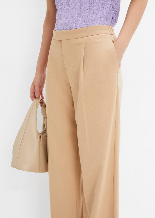 Szerokie spodnie z zakładkami