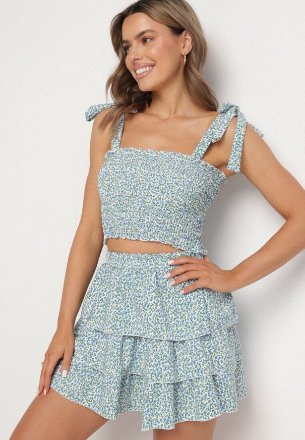 Jasnoniebieski Komplet w Kwiaty Elastyczny Top z Wiązaniami i Rozkloszowana Spódniczka Natilana