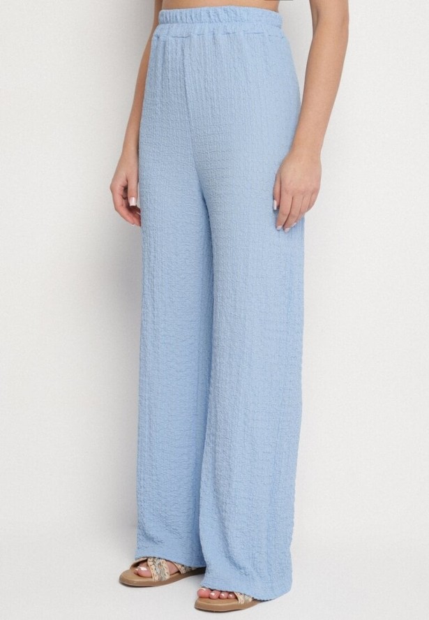 Niebieski Komplet Bluzka Bez Rękawów Zdobiona Broszkami i Szerokie Spodnie Sadaniae