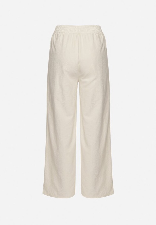 Jasnobeżowe Szerokie Spodnie z Bawełną Wysokim Stanem i Naszywką Nannirea