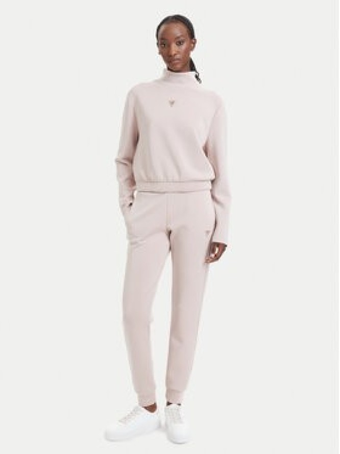 Guess Spodnie dresowe V4YB08 KCAY2 Różowy jasny Regular Fit