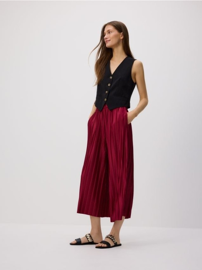 Plisowane spodnie culotte - bordowy