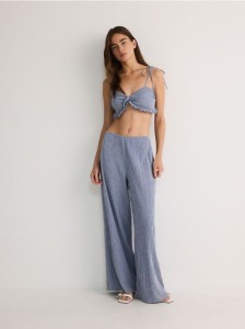 Spodnie ze strukturalnej tkaniny - granatowy