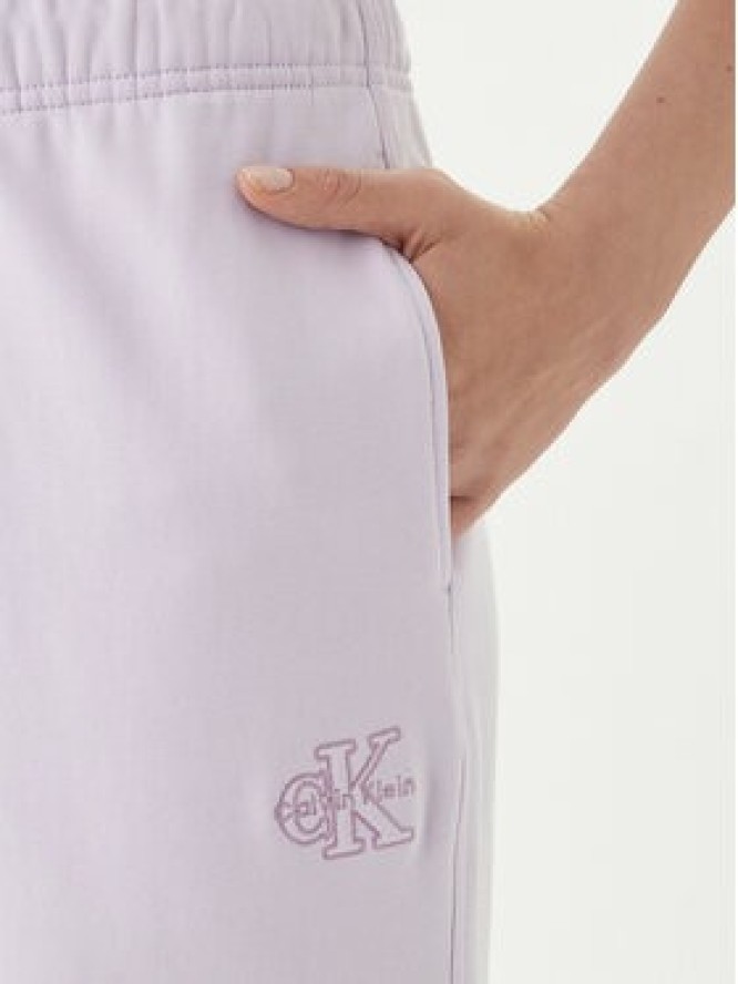Calvin Klein Jeans Spodnie dresowe Embossed Monologo LV047F206G Różowy Regular Fit