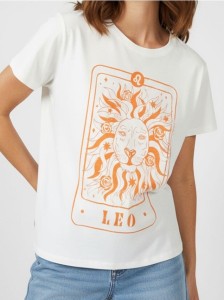 Bawełniana koszulka z nadrukiem - kremowy