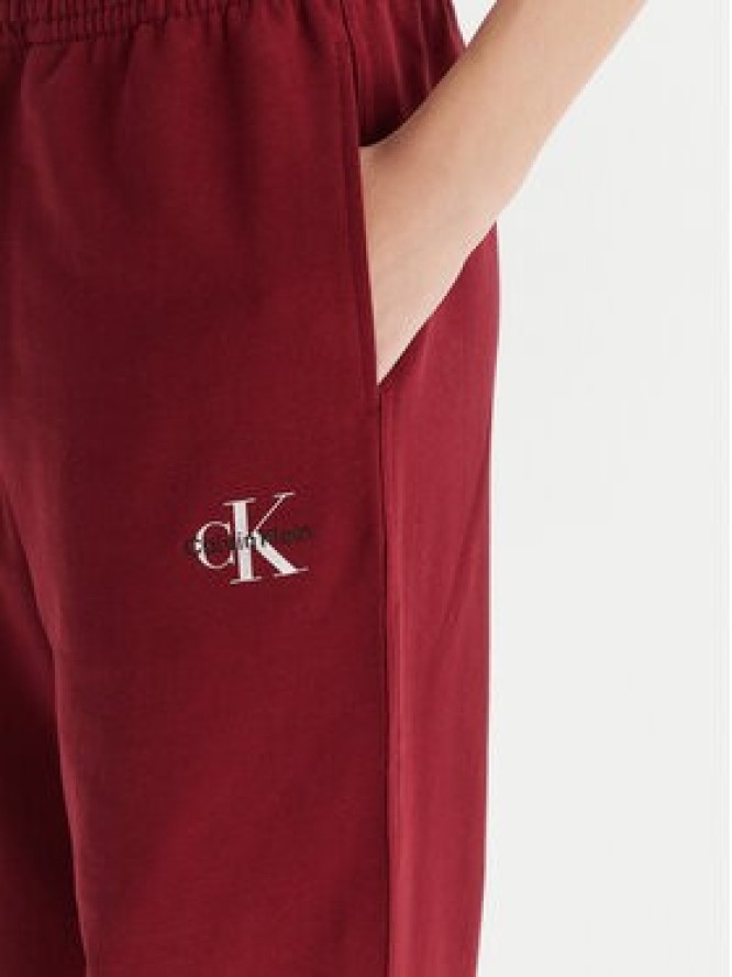 Calvin Klein Jeans Spodnie dresowe Monologo LV047B235G Bordowy Regular Fit