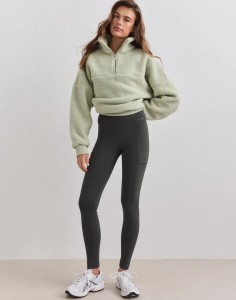 Damskie legginsy ocieplane z kieszeniami ciemnobluszczowe